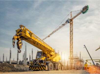 A crane is being used to lift a construction site.