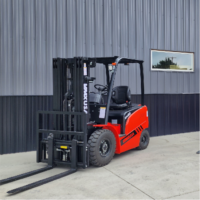 A red forklift parked in front of a building.
